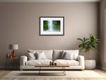 Load image into Gallery viewer, Modern living room with a white sofa, coffee table, and framed picture of a waterfall on the wall.
