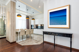 Large seascape image on kitchen wall 